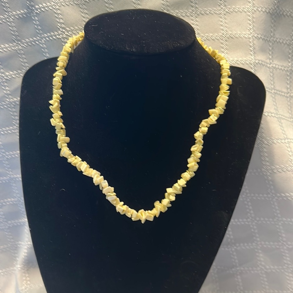 Puka shell necklace. 16” long.